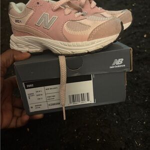 New Balance Kids Pink and White 2002R Sneakers